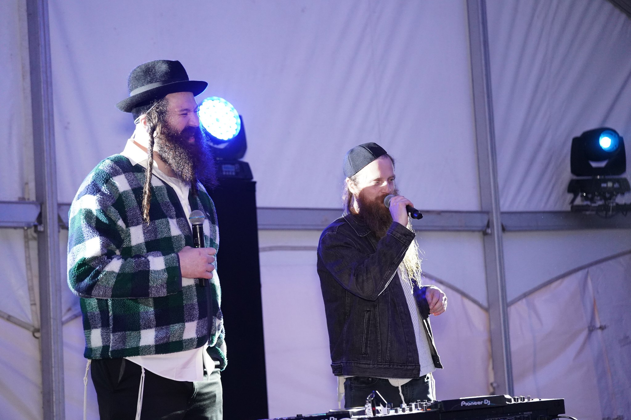 Zusha band performing together on stage at Pesach Time Tours