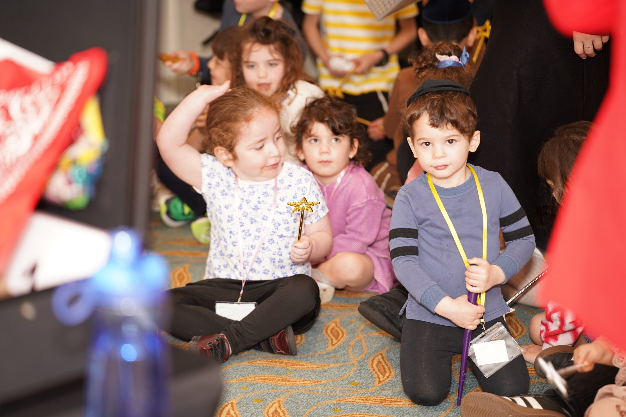 Kids with wands at Pesach Time Tours magic show
